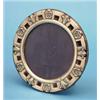 Image 1 : An Edwardian pierced silver photo frame, of circular form with Tudor rose decoration 5.5ins £100-...