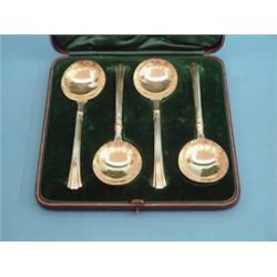 A Victorian set of 4 silver gilt serving spoons, with engraved bowls and fluted handles, makers F...