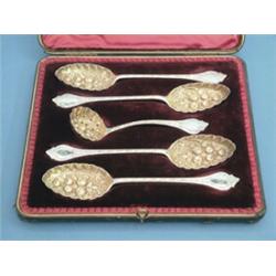 An Edwardian silver berry spoon set, comprising 4 serving spoons and sifter ladle with engraved h...