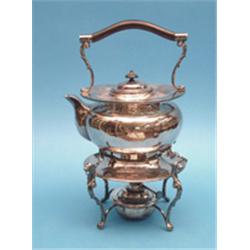A plated kettle on stand £100-150...