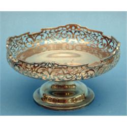 A George V silver pedestal bowl, with pierced rim, Birmingham 1928, (14ozs) £100-150...