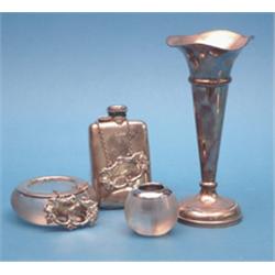 A silver pocket flask, a ribbed glass and ashtray, a match tidy, a spill vase and two decanter la...