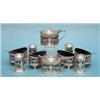 Image 1 : A late Victorian 10-piece silver condiment set, comprising 4 oval salts, 4 peppers and 2 drum mus...