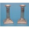 Image 1 : A pair of plated dwarf candlesticks, with fluted stems and stepped square bases, 5.75ins., togeth...