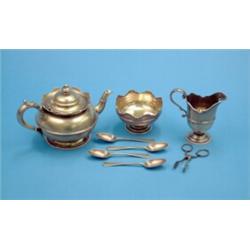A Victorian 8-piece silver gilt tea set, comprising tea pot, cream jug, sugar bowl, sugar nips an...