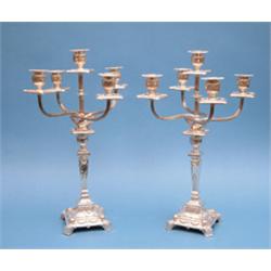 A pair of plated 5 light candelabra with reeded branches and stepped square stems, 19ins. £350-40...