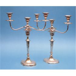 A pair of plated 3 light candelabra, of Adam design, drilled for electricity 17ins. £150-200...