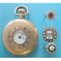 A gold plated half hunter pocket watch with subsidiary seconds dial together with 3 paste rings £...