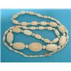 Image 1 : A single row necklace, of graduated ivory beads, 40ins £50-70...