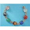 Image 1 : A 9ct gold bracelet, set seven multi coloured cabochon specimen hardstones £70-100...