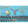 Image 1 : A 2-row necklace, of graduated garnet beads and cultured pearls with 9ct gold oval cluster clasp...