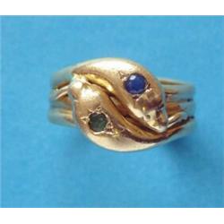A gentleman's 18ct gold double snake head ring, gypsy set with a sapphire and an emerald £100-150...