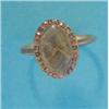Image 1 : A George III gold memorial ring, with oval plaited hair compartment bordered by a row of small ga...