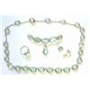 Image 1 : A suite of gold mounted faceted blue paste jewellery, comprising a riviere necklace, a crescent b...