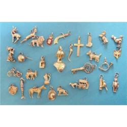 A collection of 29 various charms, mainly 9ct gold, gross weight 82grms £150-200...