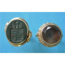A gentleman's gold seal ring, the bezel inset with an intaglio carved oval bloodstone, together w...