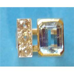 A stylish gold dress ring, of square form set with a rectangular cut aquamarine and 3 diamonds £8...