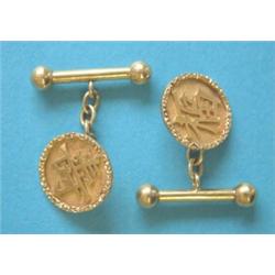 A pair of Eastern yellow metal cuff links, with Chinese character motifs and chain connections, 8...
