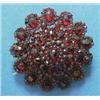 Image 1 : A Victorian garnet cluster brooch £70-100...