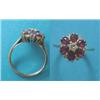Image 1 : An 18ct white gold, ruby and diamond flowerhead cluster ring £200-300...
