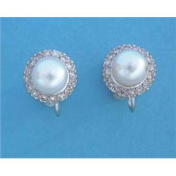 A pair of 18ct white gold cultured pearl & diamond circular cluster earrings £100-150...