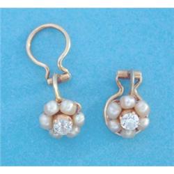 A pair of gold cultured pearl and diamond cluster earrings £200-300...