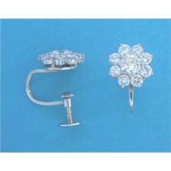 A pair of 9ct white gold and clear paste cluster earrings £20-40...