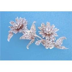 A silver floral spray double dress clip/ brooch, set synthetic spinels £80-120...