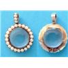 Image 1 : A Victorian gold double sided circular locket pendant, the frame and loop set split pearls £100-1...