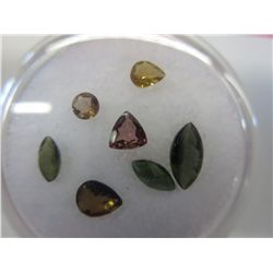 Gem jar filled with 7 genuine cut tourmalines