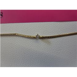 10KT yellow gold bracelet set with 1 diamond