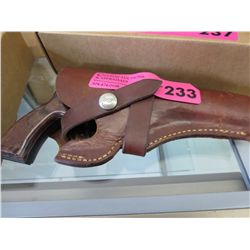Cap gun in leather holster