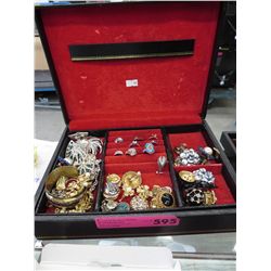 Jewelry box containing costume jewelry