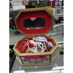 Jewelry box containing costume jewelry