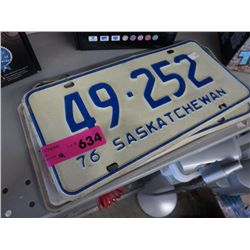 4 vintage license plates