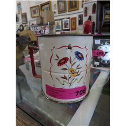 Vintage flour sifter, flower motif