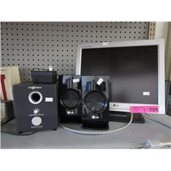 LG monitor and 4 pc speaker system