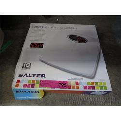 Super bright electronic scale, in box.