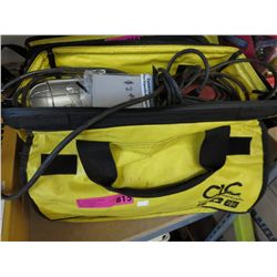 Tool tote containing assorted tools