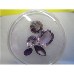 Gem jar - assorted cut amethyst gemstones