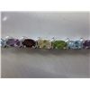Image 1 : Ladies multi gemstone tennis bracelet