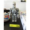 Image 1 : Key wound tin terminator toy - replica