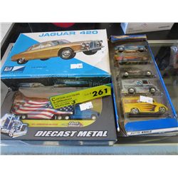 3 Die cast car sets - in Package - some Hot Wheels
