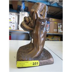 Austin Prod. Inc. statue 13" tall, 8" x 7" base.