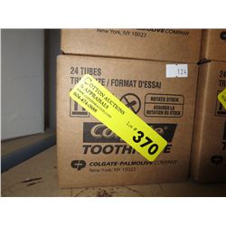 Case of Colgate trial size toothpaste