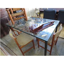 Glass top dining table with metal legs & frame