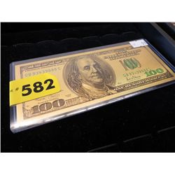 Gold foiled $100 US dollar bill