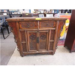 Oriental themed wood cabinet