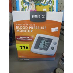 Blood pressure monitor, in box.