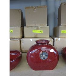 3 Glazed pottery container